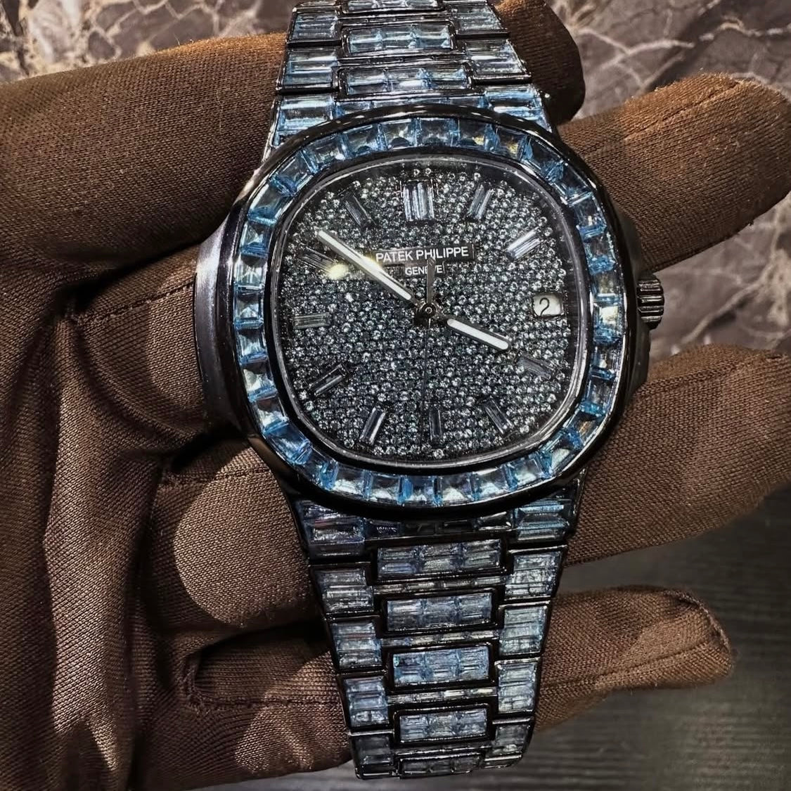 BUSSDOWN PATEK PHILLIPE GENEVE NAUTILUS W/ BLUE BAGUETTE CUT SAPPIRE STONES