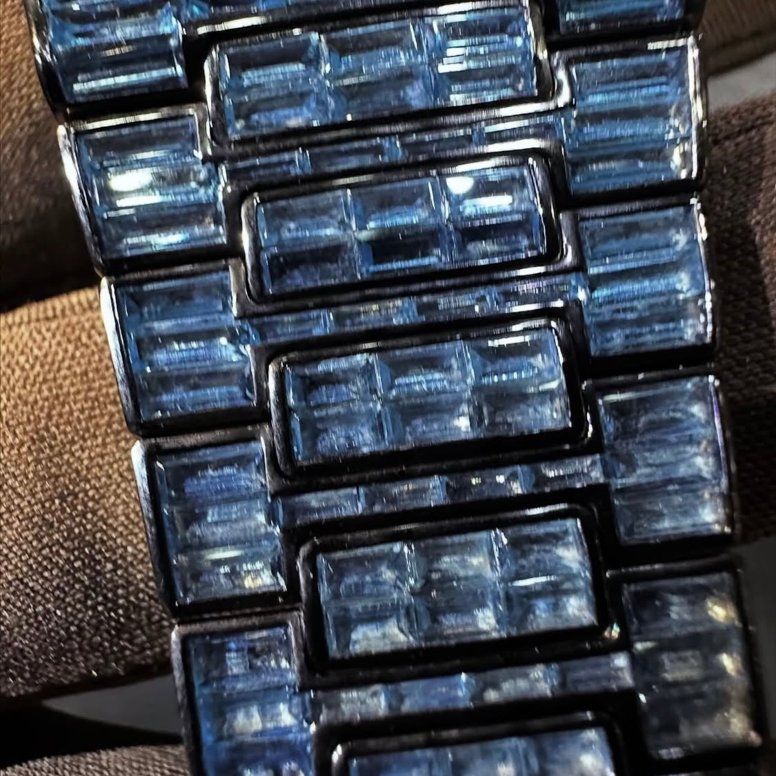 BUSSDOWN PATEK PHILLIPE GENEVE NAUTILUS W/ BLUE BAGUETTE CUT SAPPIRE STONES