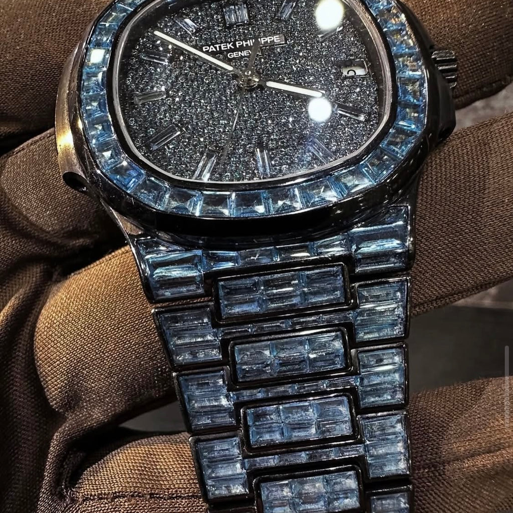 BUSSDOWN PATEK PHILLIPE GENEVE NAUTILUS W/ BLUE BAGUETTE CUT SAPPIRE STONES