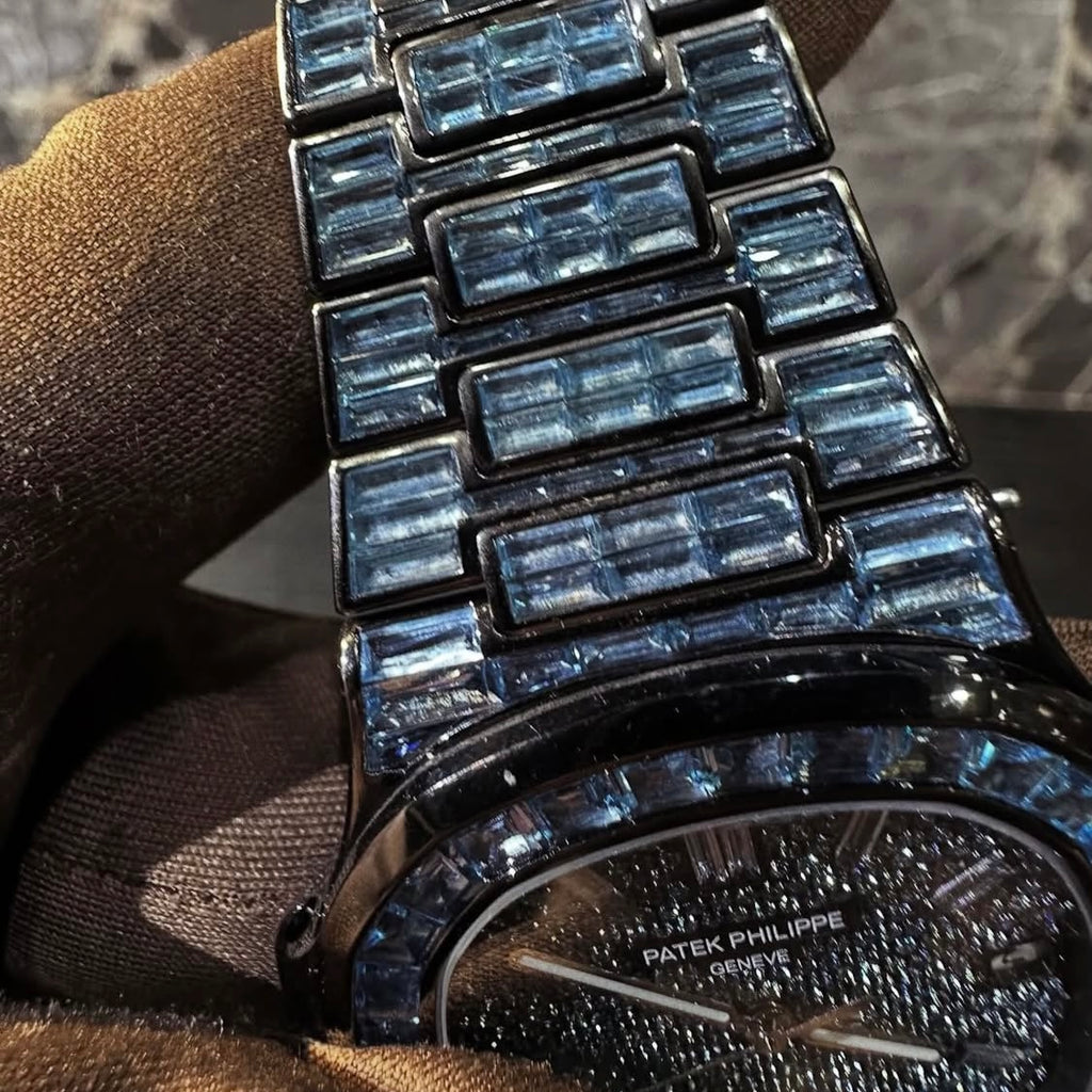 BUSSDOWN PATEK PHILLIPE GENEVE NAUTILUS W/ BLUE BAGUETTE CUT SAPPIRE STONES