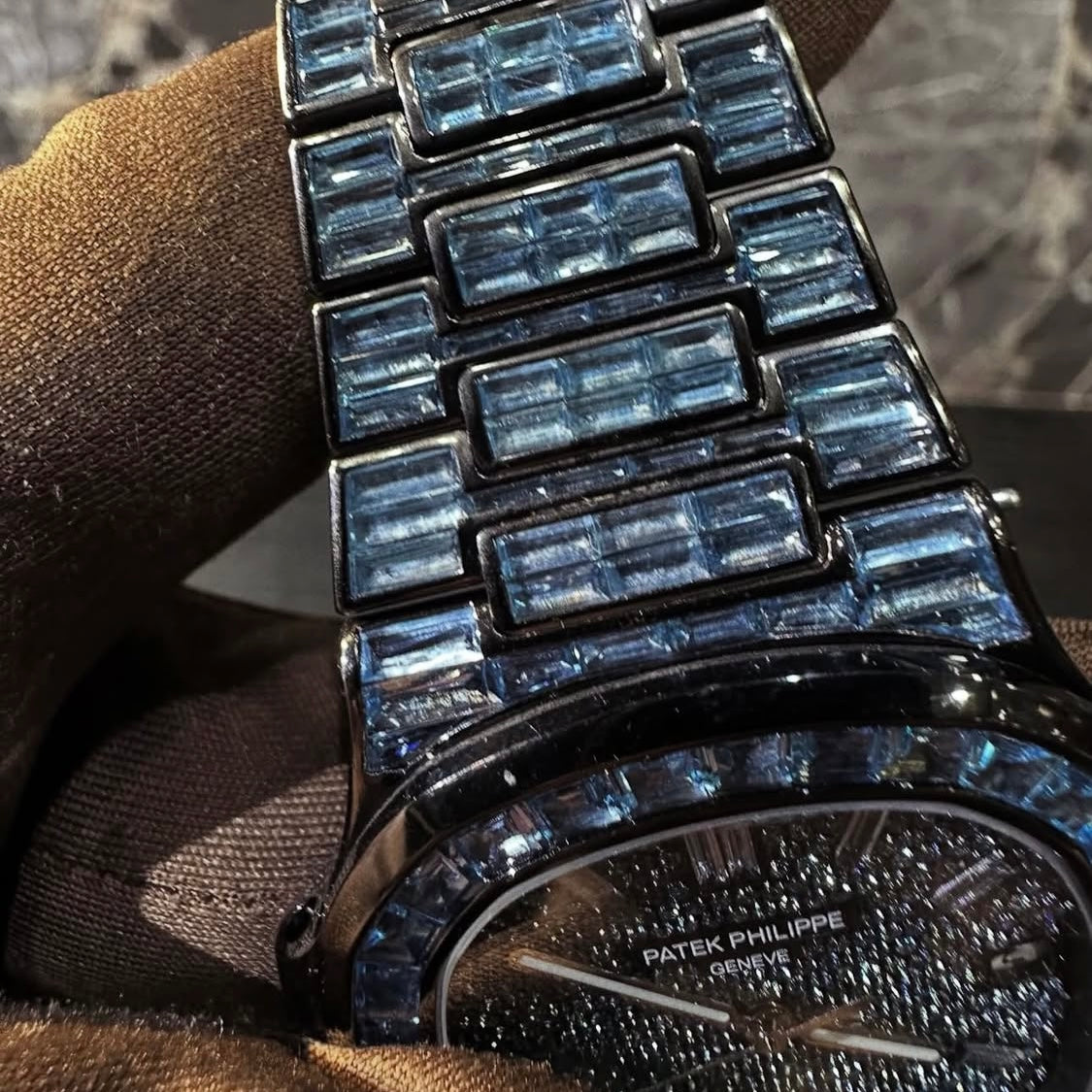 BUSSDOWN PATEK PHILLIPE GENEVE NAUTILUS W/ BLUE BAGUETTE CUT SAPPIRE STONES