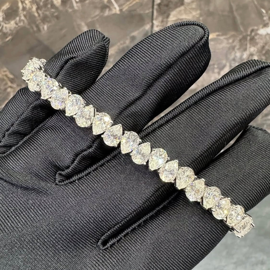 BUSSDOWN TENNIS BRACELET W/ PEAR SHAPED GEMSTONES