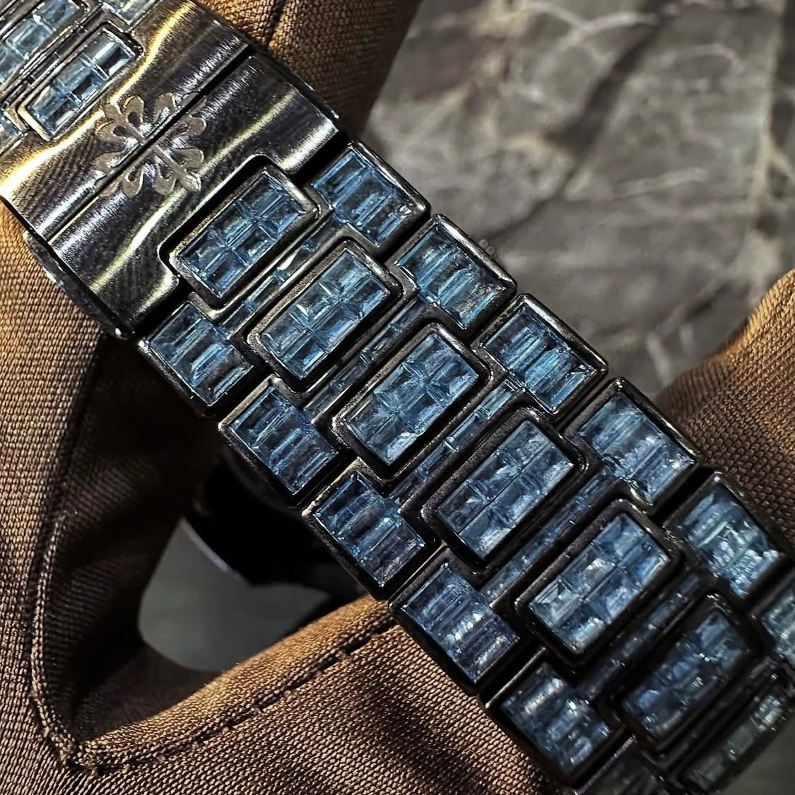 BUSSDOWN PATEK PHILLIPE GENEVE NAUTILUS W/ BLUE BAGUETTE CUT SAPPIRE STONES